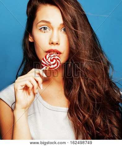 young pretty adorable woman with candy close up like doll makeup