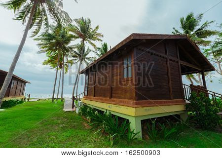 Cayo Guillermo island, Sercotel resort, Cuba, July 4, 2016, amazing gorgeous front view of bungalow house standing near the the ocean on over cast day