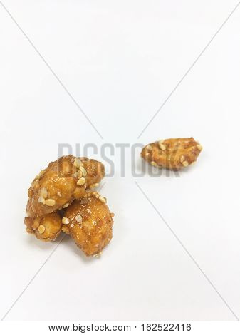 Peanut coat sugar on the white background