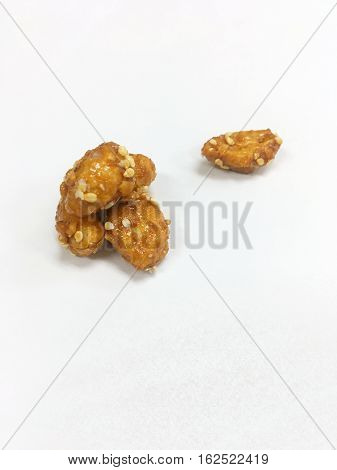 Peanut coat sugar on the white background
