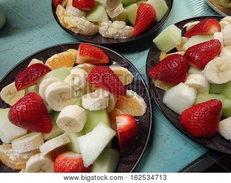A beautiful picture of some fruit salads.