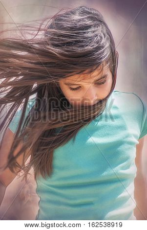 random shot of a very beautiful girl with beautiful hair