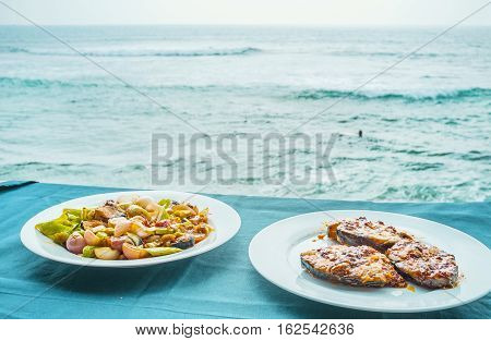 The cuisine of Sri Lanka is rich in fish dishes including fish on barbecue or deviled with vegetables local resorts are best places to enjoy it in cafes Hikkaduwa.