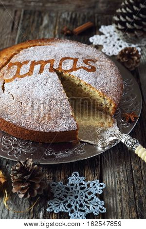 Homemade spiced Christmas cake and crocheted snowflakes