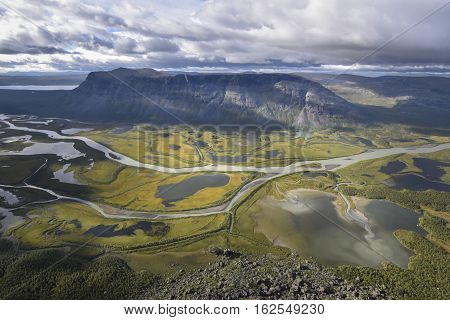 Brilliant view from Skierfe on rapadalen river valley table mountain Tjakkali delta landscape Sweden