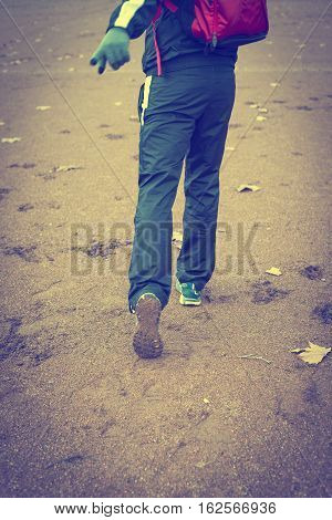 Man running away from danger. Showing danger behind.