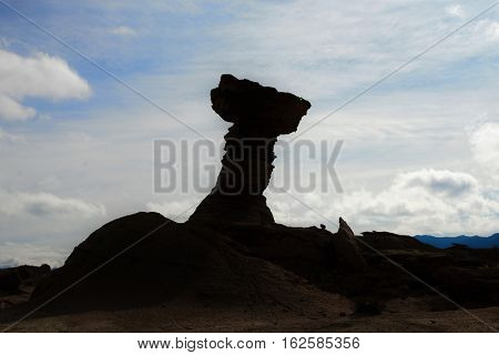 Long shot of the stone formation el Hongo in the nature reserve Ischigualasto also called Valle de la Luna in the area San Juan in Argentina South America