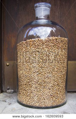 coffee bean in the big high bottle