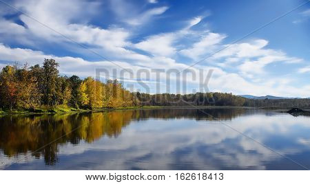 Ausable Marsh Wildlife Management Area consists of 660 acres adjacent to Lake Champlain in upper New York State. This image was taken on a pellucid October day. The view is to the west and in the background of the image are some foothills to the Adirondac