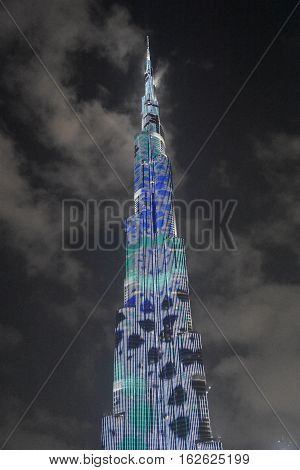 DUBAI, UAE - DEC 9: The LED lights show at Burj Khalifa in Dubai, UAE, as seen on Dec 9, 2016. The show titled Ascension, by London-based Yusuke Murakami and Tangent Design and Invention illuminated and animated the Burj Khalifa during Dubai Design Week.