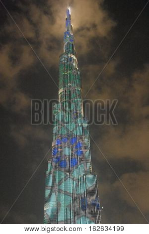 DUBAI, UAE - DEC 9: The LED lights show at Burj Khalifa in Dubai, UAE, as seen on Dec 9, 2016. The show titled Ascension, by London-based Yusuke Murakami and Tangent Design and Invention illuminated and animated the Burj Khalifa during Dubai Design Week.