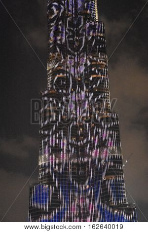 DUBAI, UAE - DEC 9: The LED lights show at Burj Khalifa in Dubai, UAE, as seen on Dec 9, 2016. The show titled Ascension, by London-based Yusuke Murakami and Tangent Design and Invention illuminated and animated the Burj Khalifa during Dubai Design Week.