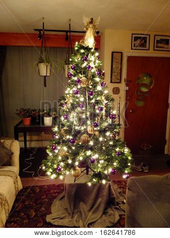 Purple themed Christmas Tree with an angel on top