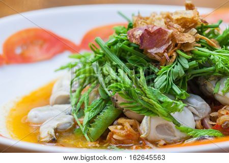 Spicy Oysters Salad with Young Tamarind Leafs