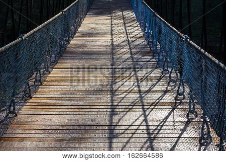 Wood bridge over the river at Thung Salaeng Luang National Park Thailand.