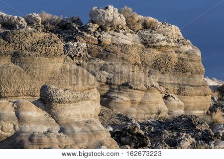 Tufa formations along a lake bed in the desert
