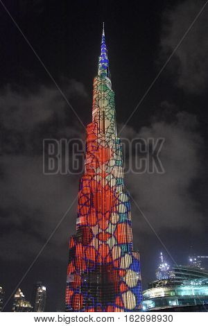 DUBAI, UAE - DEC 9: The LED lights show at Burj Khalifa in Dubai, UAE, as seen on Dec 9, 2016. The show titled Ascension was created by London-based Yusuke Murakami and Tangent Design and Invention.