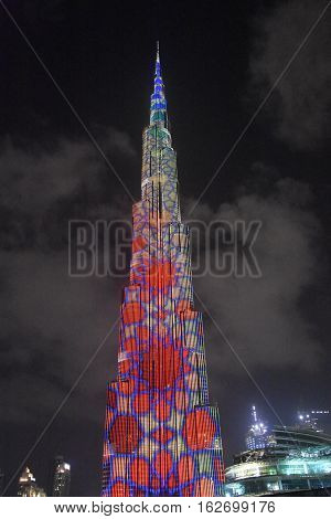 DUBAI, UAE - DEC 9: The LED lights show at Burj Khalifa in Dubai, UAE, as seen on Dec 9, 2016. The show titled Ascension was created by London-based Yusuke Murakami and Tangent Design and Invention.