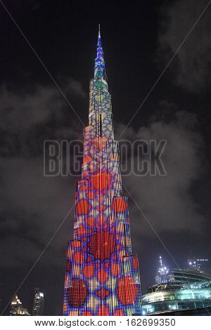 DUBAI, UAE - DEC 9: The LED lights show at Burj Khalifa in Dubai, UAE, as seen on Dec 9, 2016. The show titled Ascension was created by London-based Yusuke Murakami and Tangent Design and Invention.