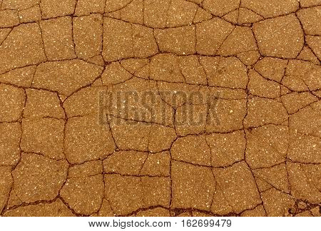 Orange Toned Damaged Asphalt Texture.