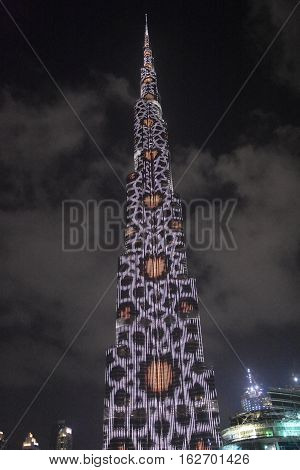 DUBAI, UAE - DEC 9: The LED lights show at Burj Khalifa in Dubai, UAE, as seen on Dec 9, 2016. The show titled Ascension was created by London-based Yusuke Murakami and Tangent Design and Invention.