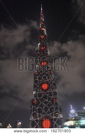 DUBAI, UAE - DEC 9: The LED lights show at Burj Khalifa in Dubai, UAE, as seen on Dec 9, 2016. The show titled Ascension was created by London-based Yusuke Murakami and Tangent Design and Invention.