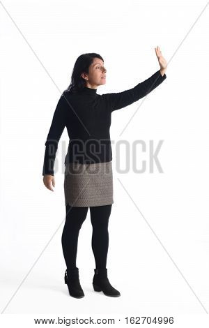 Woman with the arm raised on a  white background color