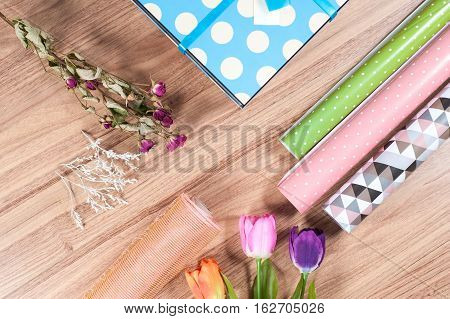 florist desktop with working tools and materials