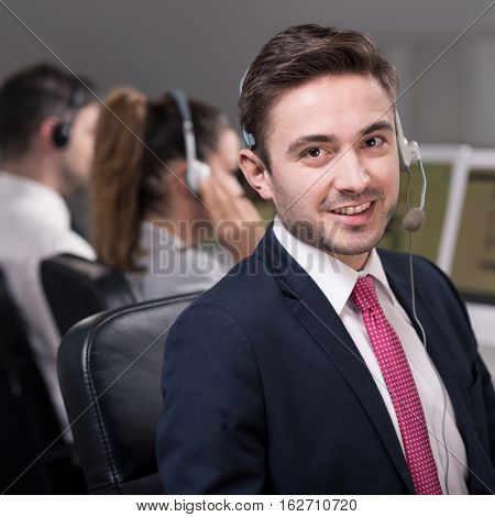 Young Consultant With Co-workers