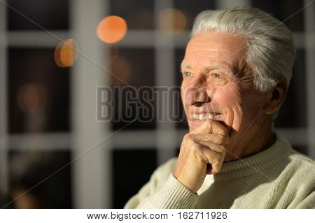 Portrait of a smiling senior man close-up