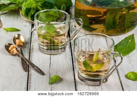 Basil Herbal Tea On Wooden Table
