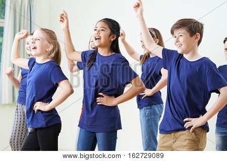 Group Of Children Enjoying Drama Class Together