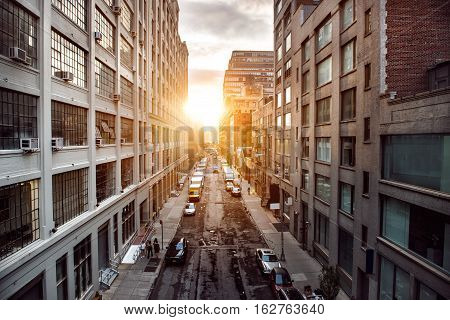 Beautiful sunset light on New York City Manhattan street.