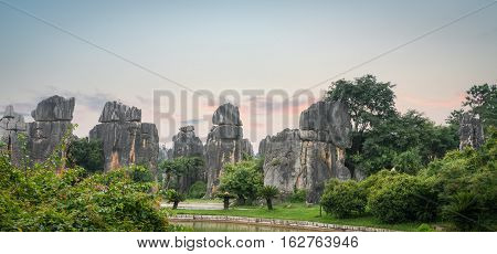 beautiful stone forest scenic national park at dusk in yunnan province China.