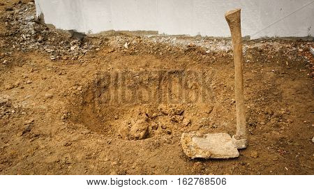 in the middle of digging soil photo taken in Bogor Indonesia java