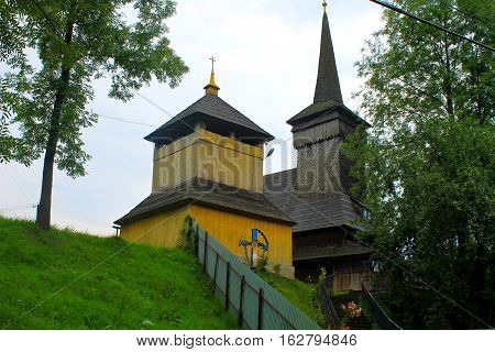 Wooden church in the village in Transcarpathia, Ukraine
