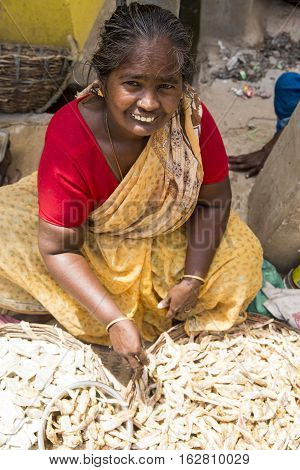 Illustrative image. Pondicherry Tamil Nadu India - July 03 2014. Poor woman worker in small village very hard work for little money roupies