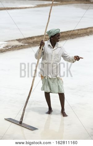 Illustrative image. Pondicherry Tamil Nadu India - July 03 2014. Poor woman worker in small village very hard work for little money roupies