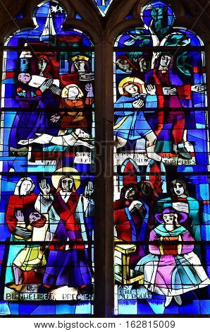 Gournay en Bray France - september 7 2016 : stained glass window of the Saint Hildevert collegiate church
