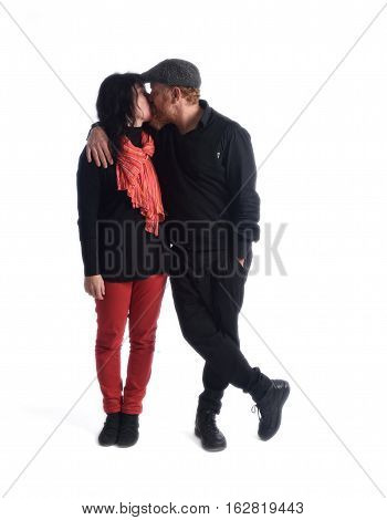 Loving couple on a white background, kiss