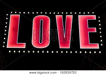 The word LOVE spelt out in lights.