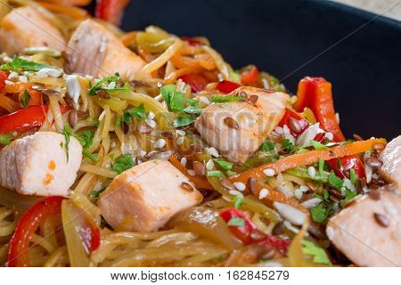 Close Up Of Salmon Pasta And Veggetables