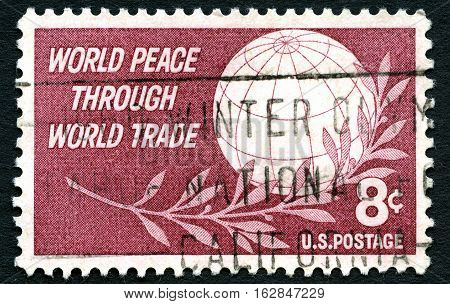 UNITED STATES OF AMERICA - CIRCA 1959: A used US postage stamp promoting the message of World Peace Through Trade circa 1959.