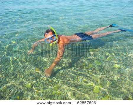 Snorkelling in the clear water of the Adriatic Sea Vodice Croatia.