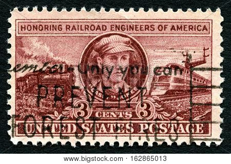 UNITED STATES OF AMERICA - CIRCA 1945: A used postage stamp from the USA issued to honor the skilled work of the Railroad Engineers of America circa 1945.