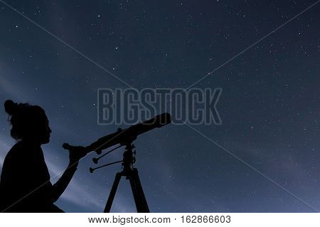 Woman With Telescope Watching The Stars. Stargazing Woman And Night Sky.