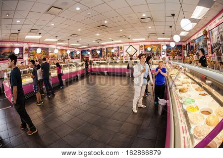 VANCOUVER - JULY 11: Customers at the famous La Casa Gelato shop in Vancouver July 11, 2016. It is renowned as the only ice cream shop in the world to carry 238 flavors on location at a time.