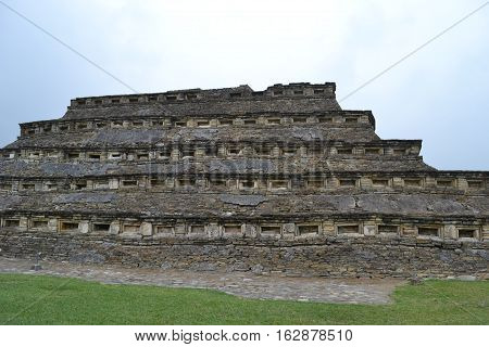 Ruins and pyramids during a thunderstorm at the pre-Columbian archeological site El Tajin in Papantla, Veracruz, Mexico