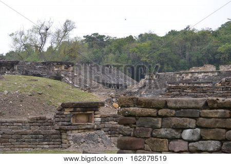 Ruins and pyramids during a thunderstorm at the pre-Columbian archeological site El Tajin in Papantla, Veracruz, Mexico
