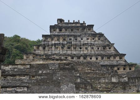 Pyramid of the Niches at the pre-columbian archeological site known as El Tajin located in Papantla, Veracruz, Mexico taken during a thunderstorm